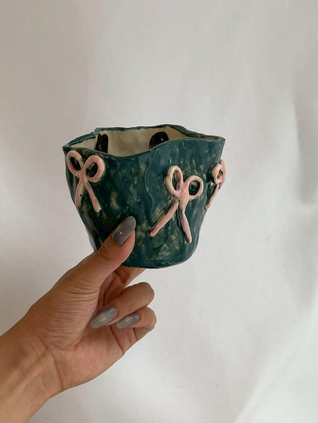 handmade ceramic art cup – ribbon motif