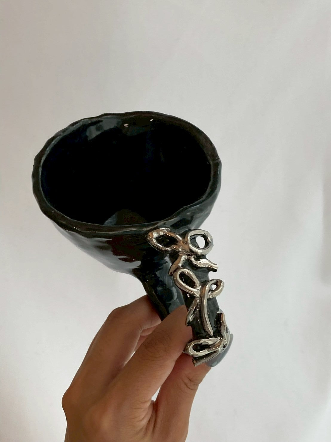 handmade ceramic art object – silver handle