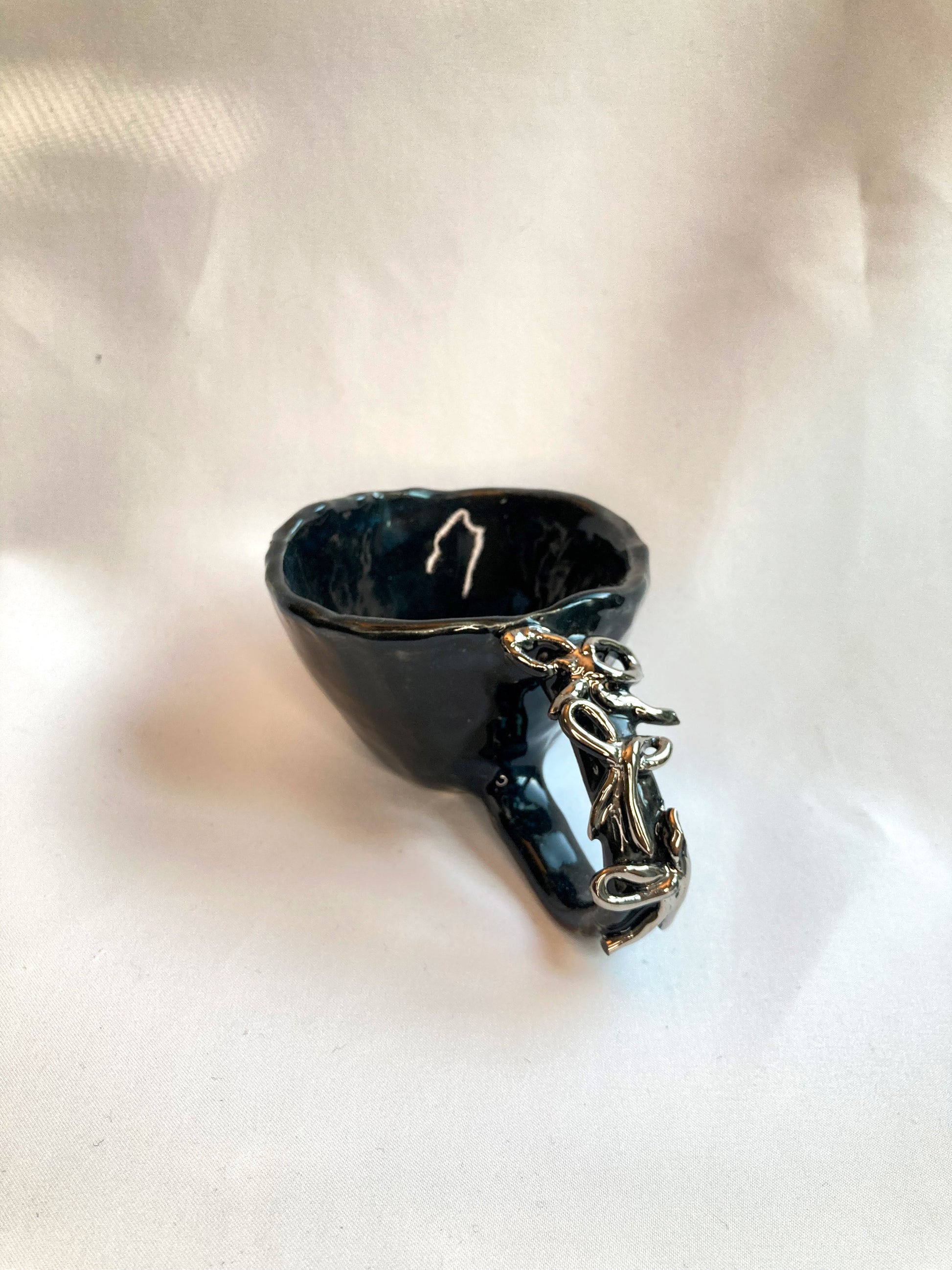 handmade ceramic art object – silver handle