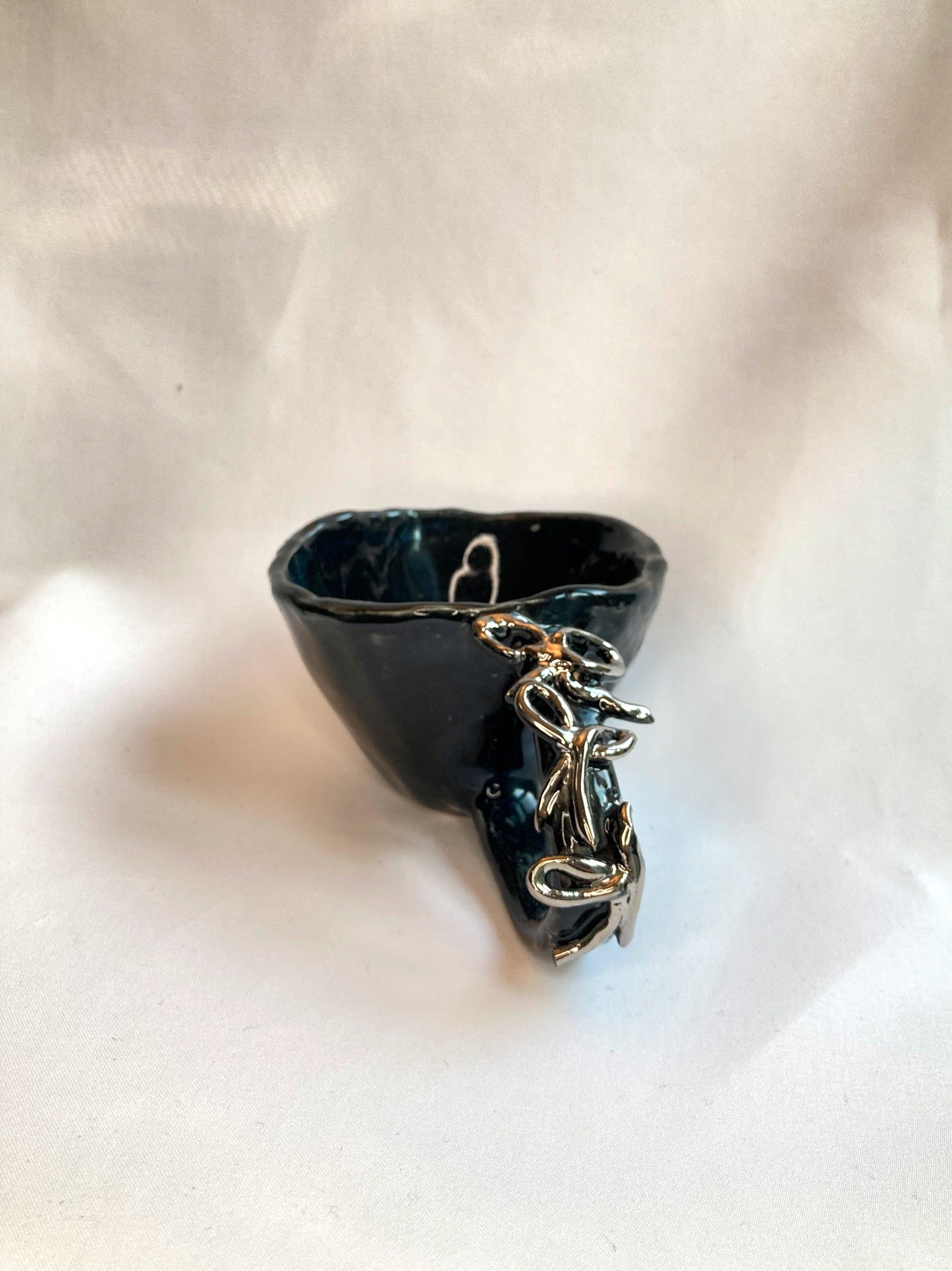 handmade ceramic art object – silver handle